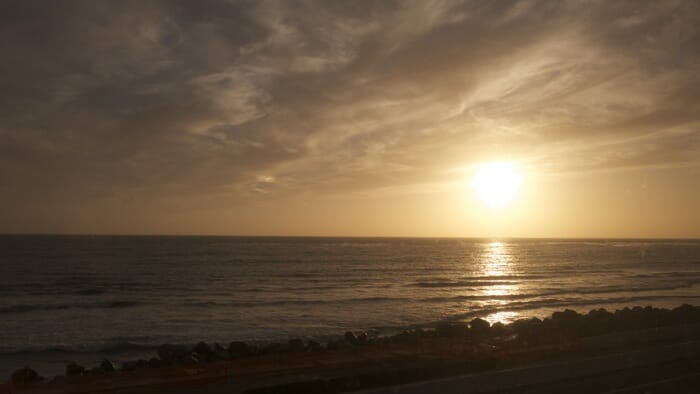 The Coast Starlight train runs along the beach for almost an hour as it approaches LA. This is the sun setting over the Pacific Ocean.