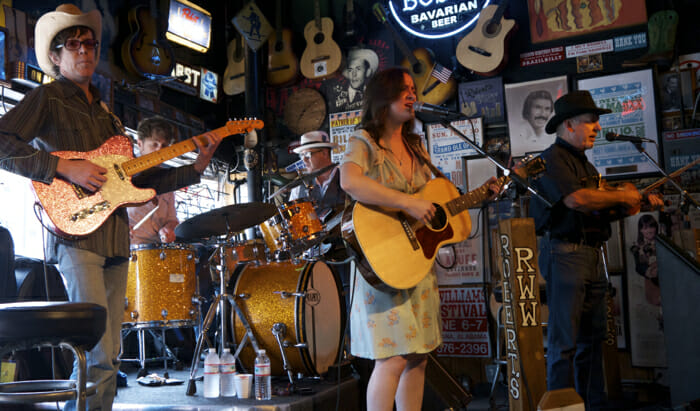 Music is free, or almost free in Nashville. Tip the band as well as your server.