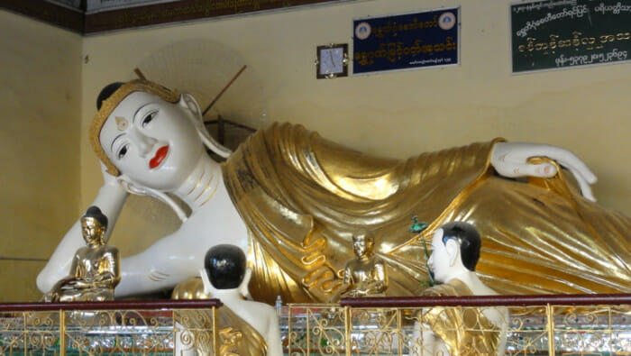 Reclining buddha position indicates the end of life and approach of nirvana.