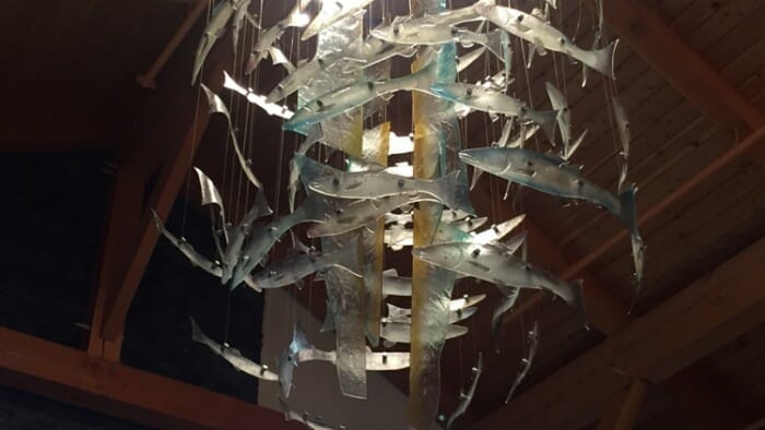 Fish chandelier in the Authentic Seacoast Distillery tasting room.