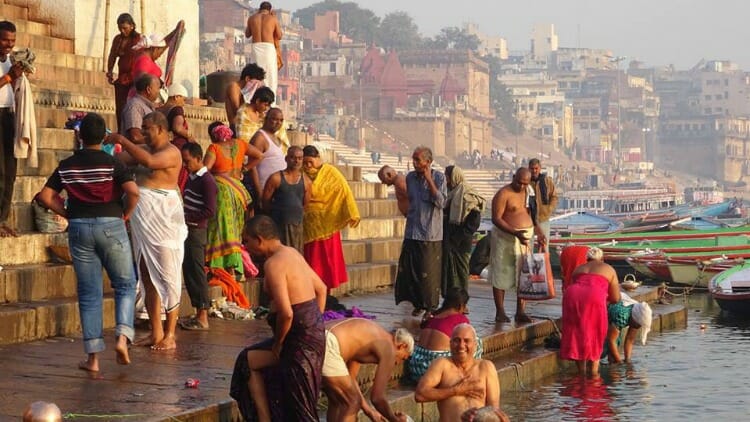 locals bathing in the Ganges river