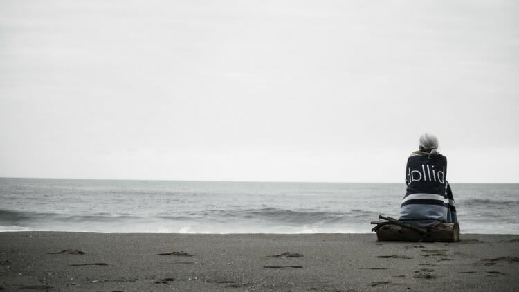 photo, image, woman on beach senior solo travel