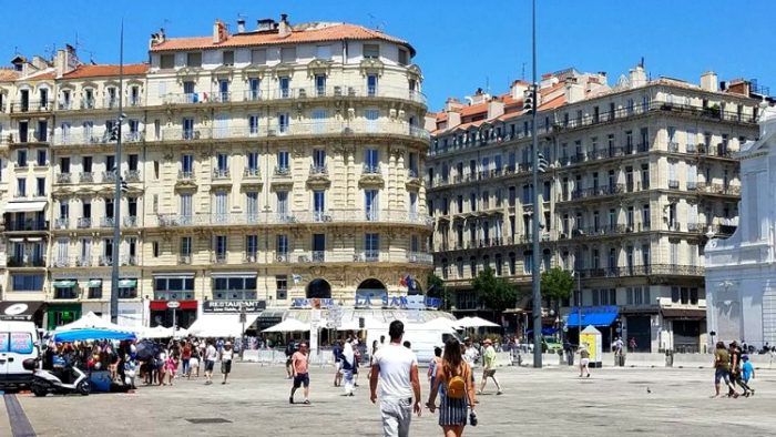 people strolling, marseilles, france photos