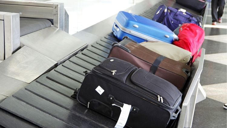 Carry-on vs checked bag: what's the best way to travel?