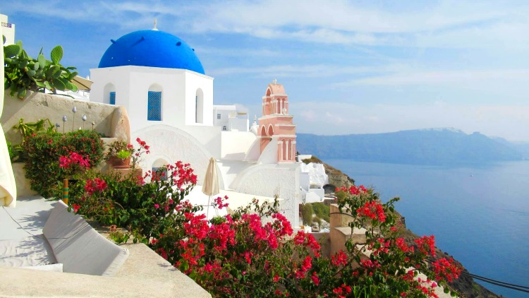 blue-domed church in oia, santorini