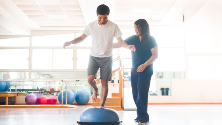 man working with trainer to get fit for travel