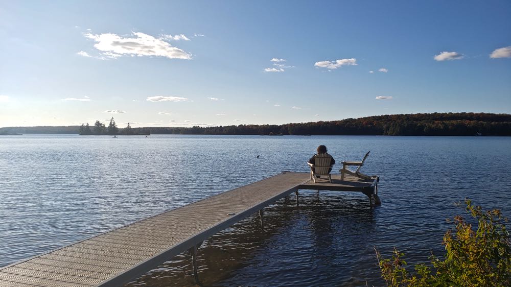 Woman on dock travel to cottage country