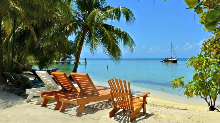 hopkins, belize, beach chairs, relaxing places to travel alone