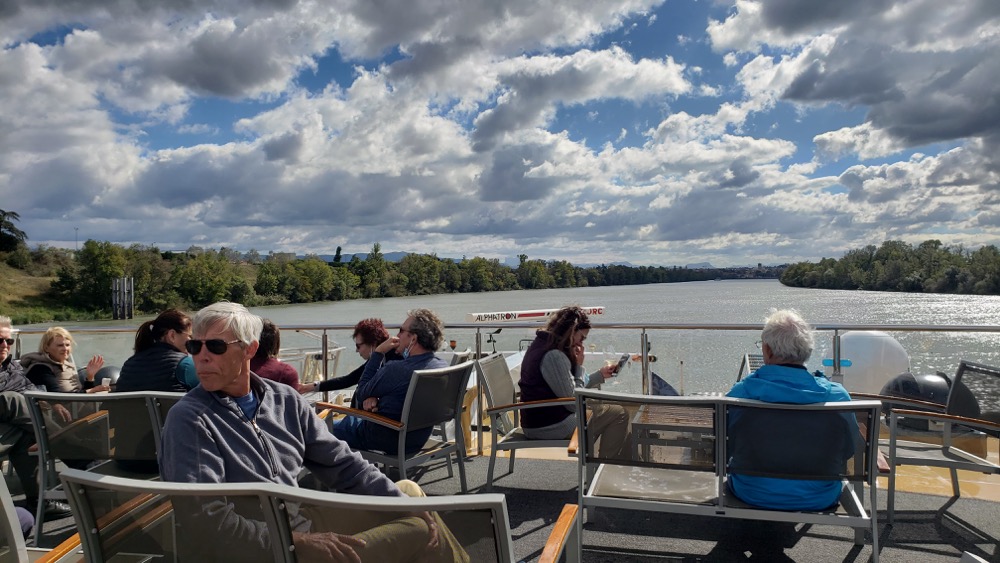 solo travelers on the deck of a river cruise ship