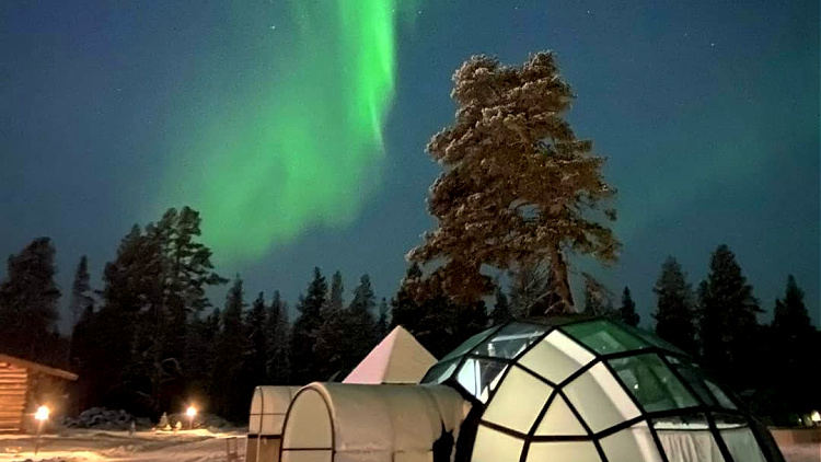 Solo travel to Lapland may include viewing the northern lights.