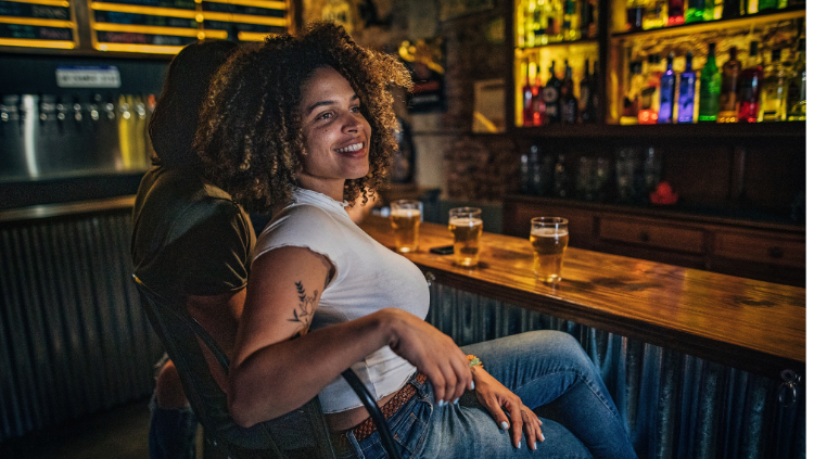 woman sitting at bar