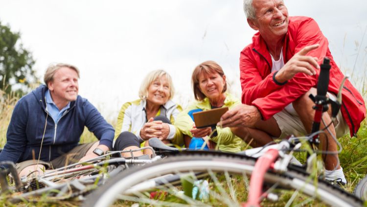 people traveling solo in retirement on a group cycling tour