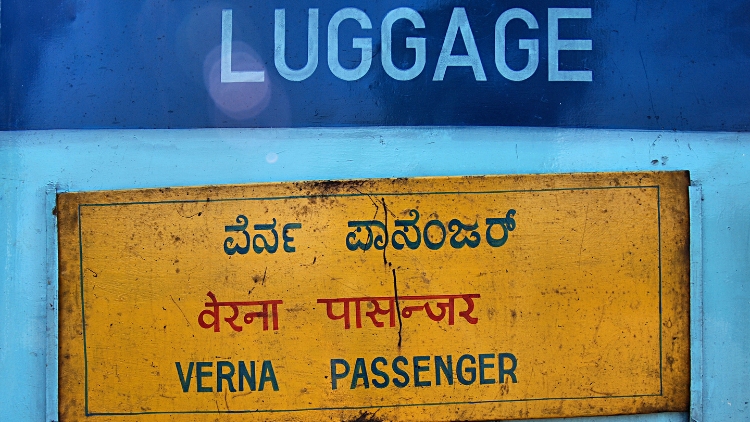 A luggage sign at a train station in India