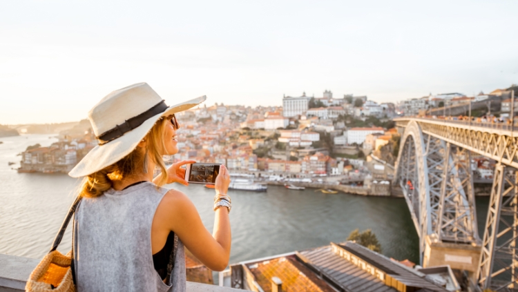 female traveler taking photo