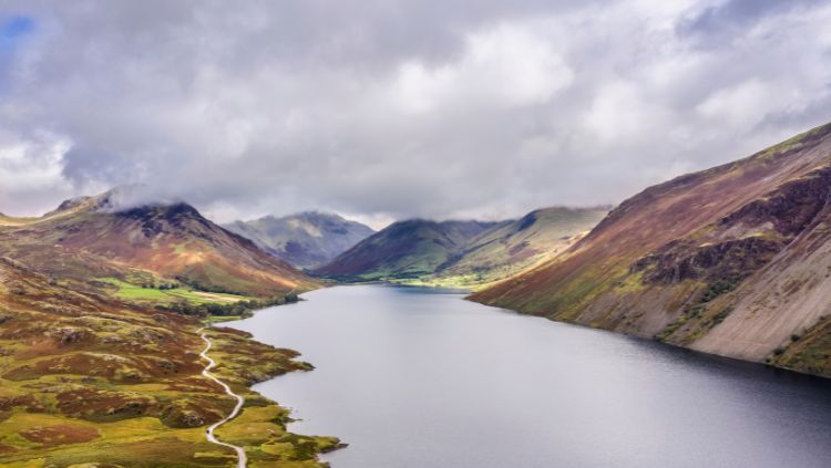 landscape photo of mountains and water