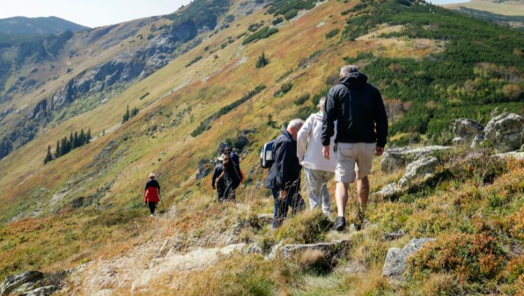 Image of several people on a hike, one of the easiest ways to meet people while traveling solo