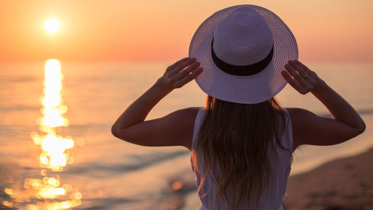 woman on sunset beach