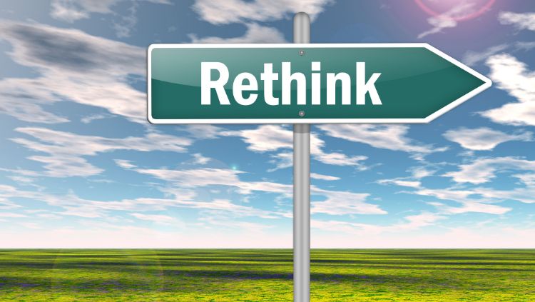 road sign with the word "rethink"