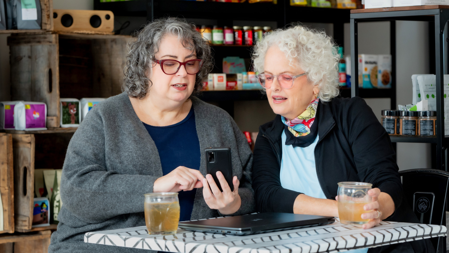 Tracey and Janice working on Tracey's List in a cafe