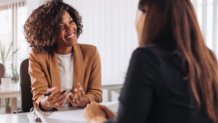 woman chatting with trusted travel agent