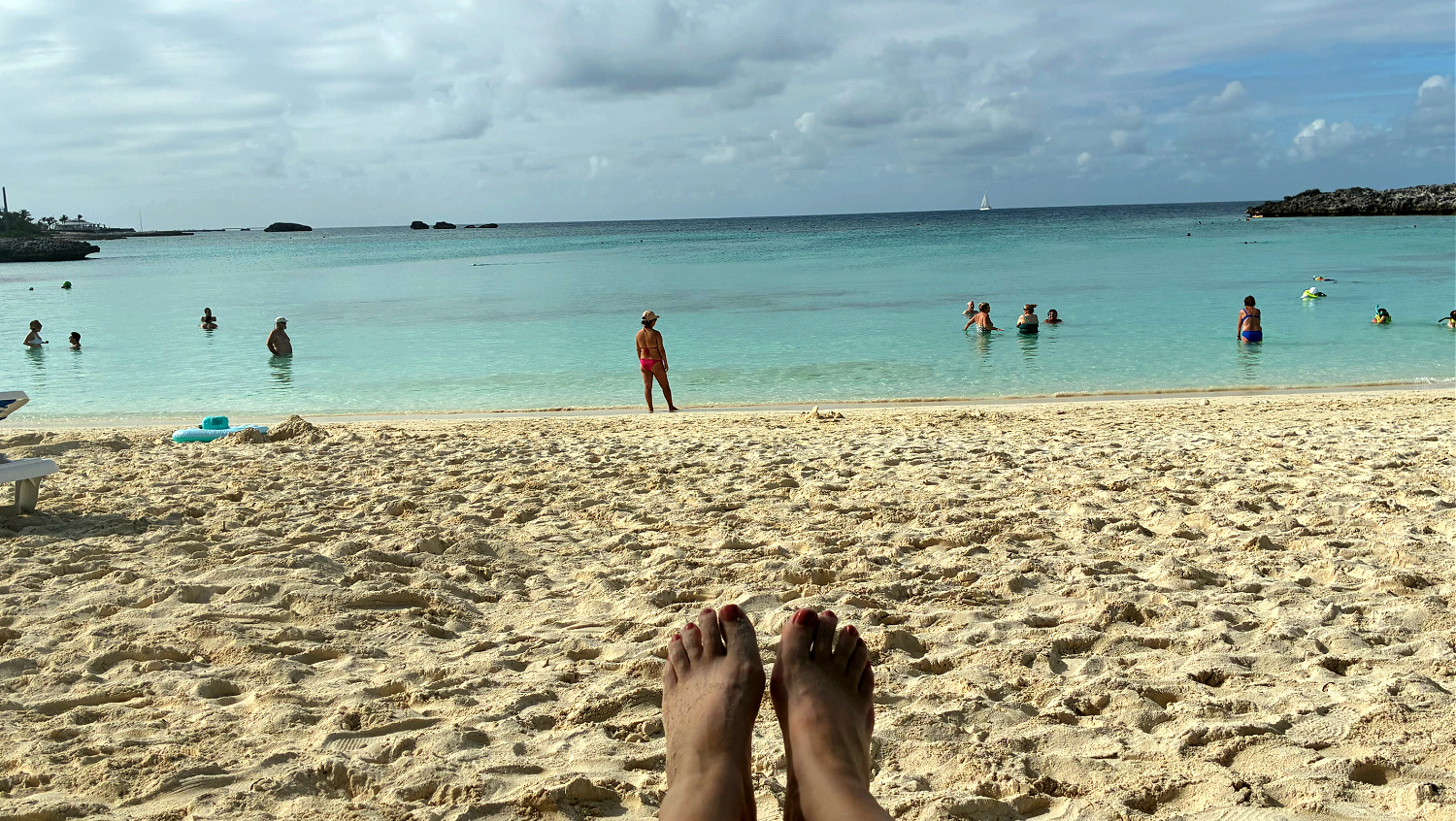 solo on a cruise, joy disembarks to enjoy some sun on a beach