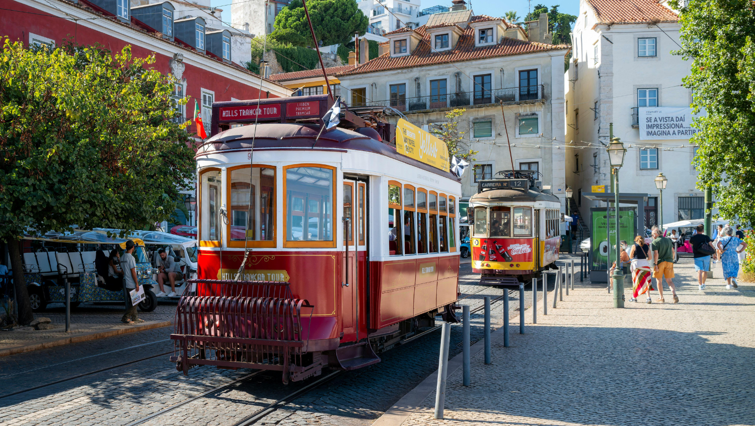 live like a local by taking public transit, like this tram in lisbon